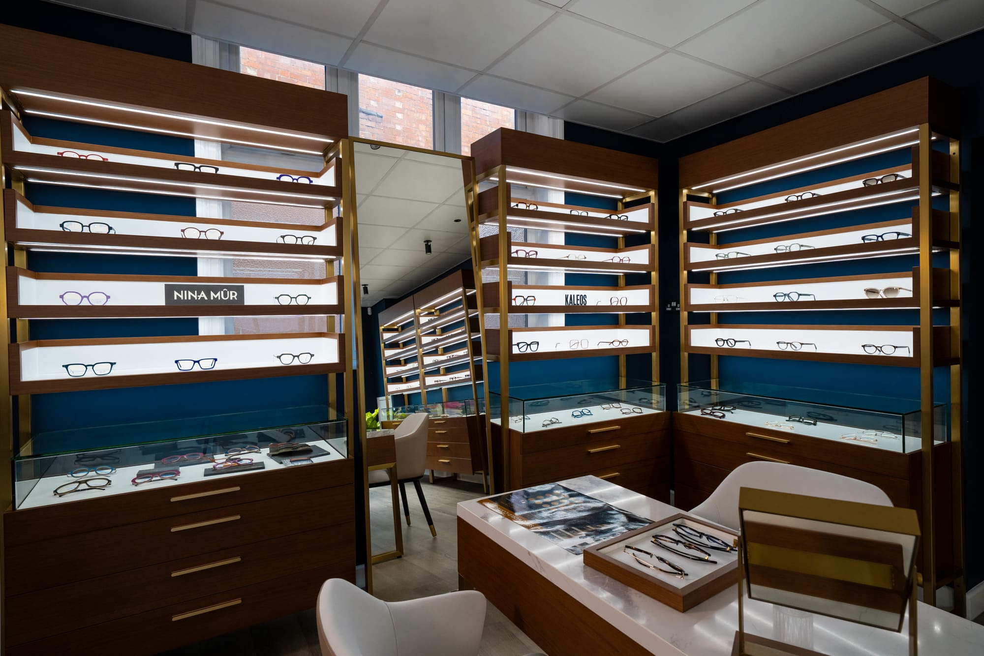 Styling desks surrounded by designer frame displays