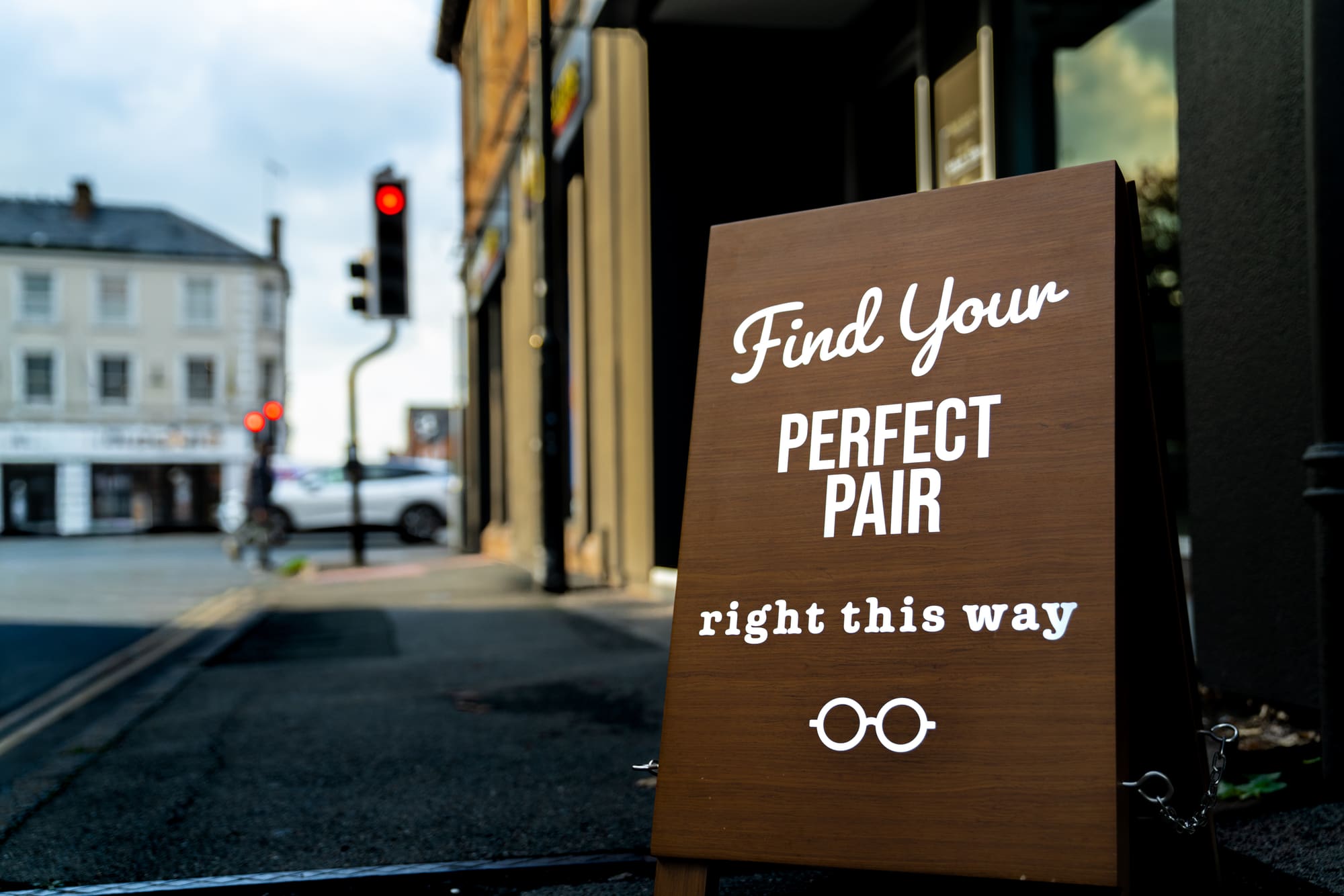 Find your perfect pair sign outside Peek And Co. Opticians